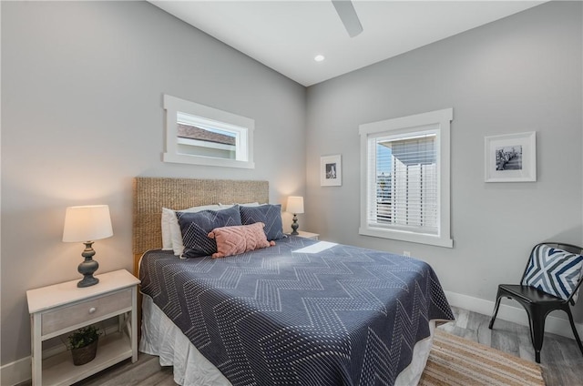 bedroom featuring ceiling fan and wood-type flooring