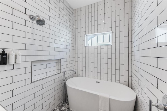 bathroom with independent shower and bath and tile walls