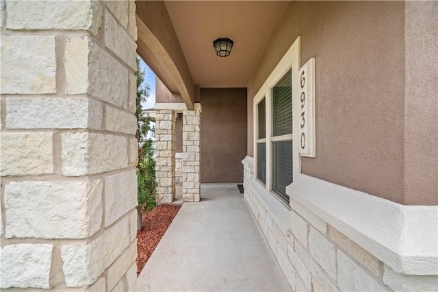 6930 Anastasia, Corpus Christi, TX 78413 - property entrance with stucco siding