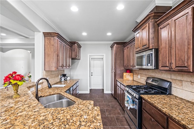 6930 Anastasia, Corpus Christi, TX 78413 - kitchen with appliances with stainless steel finishes, a sink, baseboards, light stone countertops, and recessed lighting