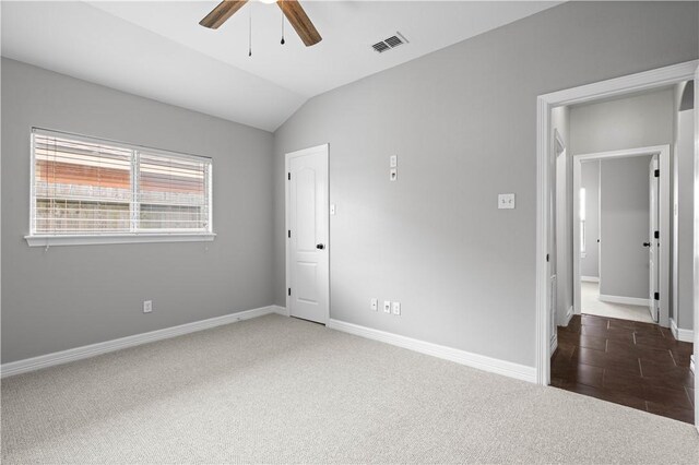 6930 Anastasia, Corpus Christi, TX 78413 - carpeted empty room with ceiling fan, vaulted ceiling, and baseboards