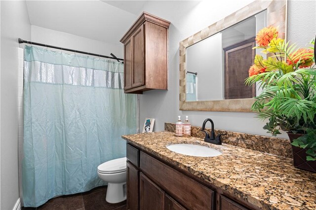 6930 Anastasia, Corpus Christi, TX 78413 - bathroom with toilet, vanity, and a shower with shower curtain