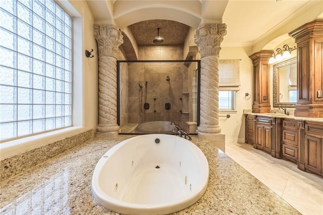 6522 Miranda Dr, Corpus Christi, TX 78414 - full bath featuring decorative columns, vanity, a stall shower, a whirlpool tub, and crown molding