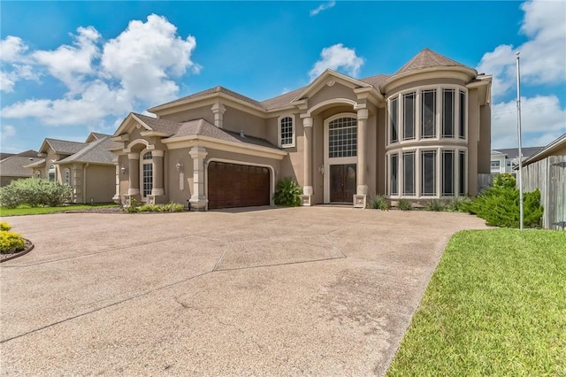 6522 Miranda Dr, Corpus Christi, TX 78414 - view of front of property with stucco siding, driveway, and an attached garage