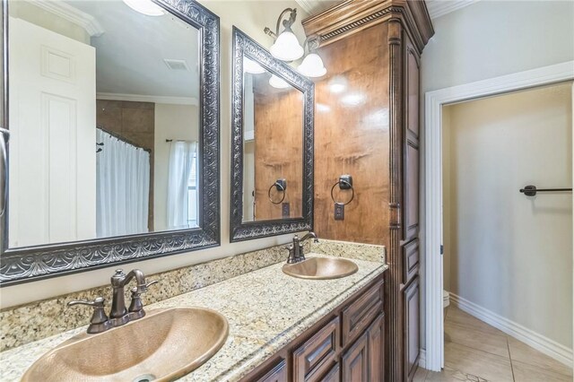 6522 Miranda Dr, Corpus Christi, TX 78414 - full bath with double vanity, crown molding, and baseboards