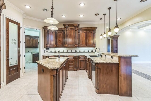 6522 Miranda Dr, Corpus Christi, TX 78414 - kitchen featuring arched walkways, light stone countertops, backsplash, light tile patterned floors, and a sink