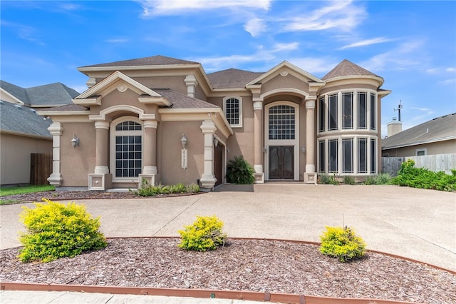 6522 Miranda Dr, Corpus Christi, TX 78414 - view of front of house featuring stucco siding and curved driveway