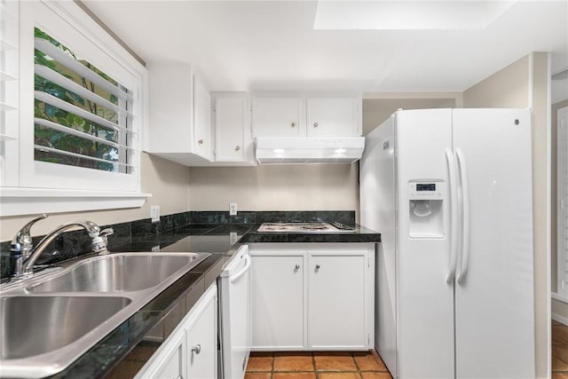 kitchen with sink, white cabinets, and white appliances