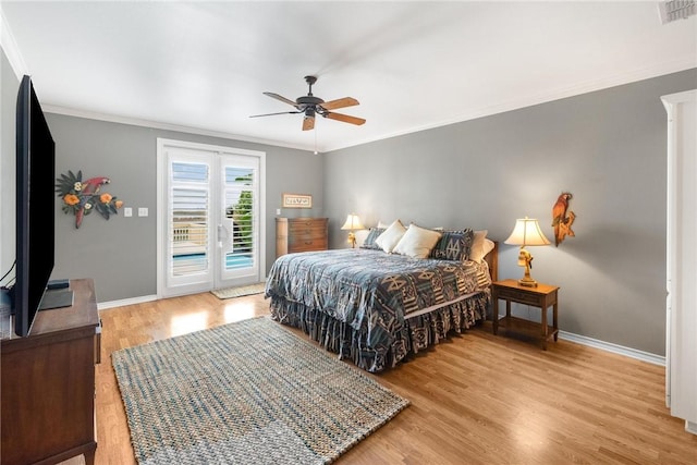 bedroom with light wood-type flooring, access to outside, ceiling fan, and ornamental molding