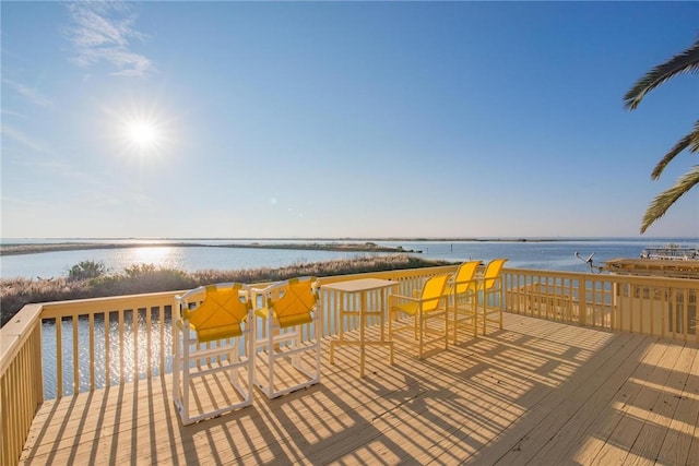 deck featuring a water view