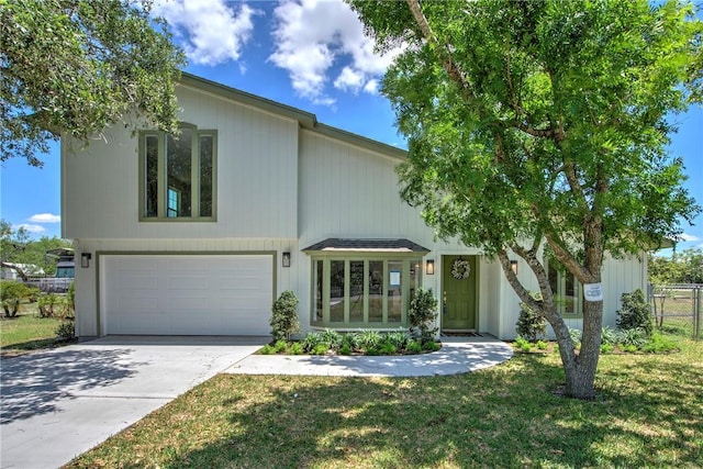 2322 Violet, Corpus Christi, TX 78410 - view of front of home with an attached garage and concrete driveway
