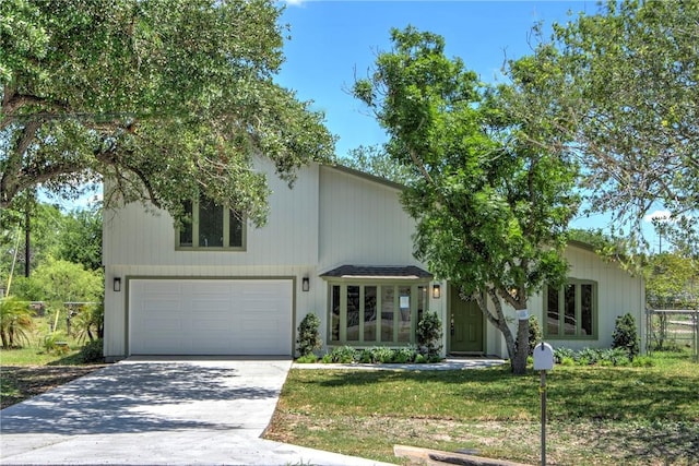 2322 Violet, Corpus Christi, TX 78410 - view of front facade featuring an attached garage and driveway