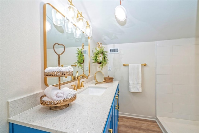 2322 Violet, Corpus Christi, TX 78410 - bathroom with wood finished floors and vanity