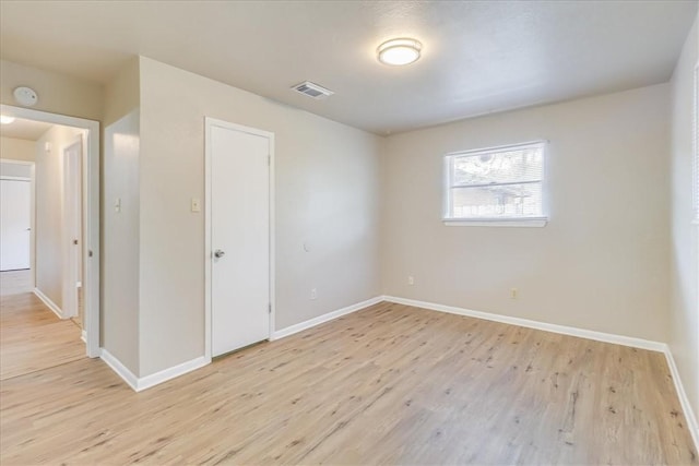 4113 Sierra St, Corpus Christi, TX 78410 - unfurnished bedroom featuring light wood-style flooring and baseboards