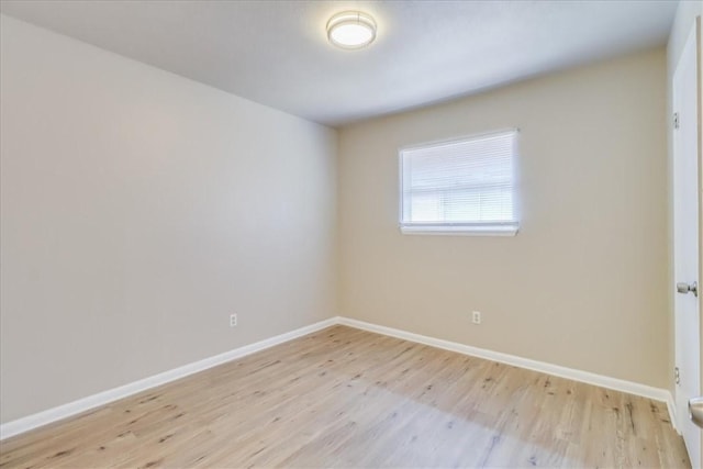 4113 Sierra St, Corpus Christi, TX 78410 - empty room featuring light wood-style floors and baseboards