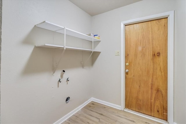 4113 Sierra St, Corpus Christi, TX 78410 - washroom with wood finished floors, hookup for a gas dryer, and baseboards