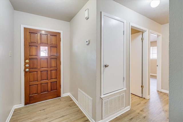 4113 Sierra St, Corpus Christi, TX 78410 - foyer with light wood-style floors and baseboards