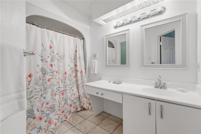 bathroom with vanity and tile patterned floors