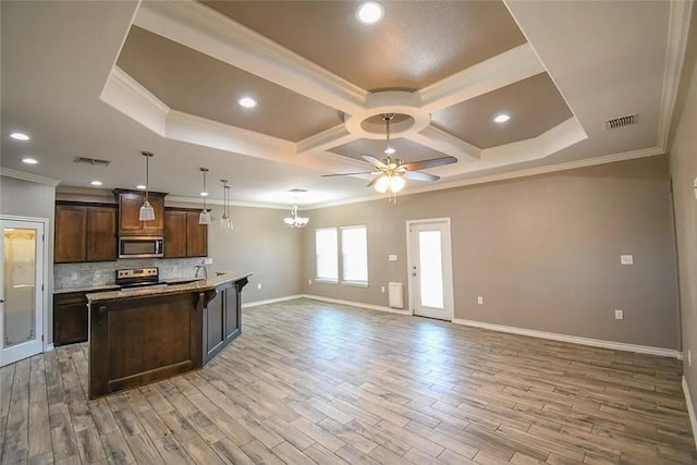 1325 S Mccampbell St, Aransas Pass, TX 78336 - kitchen with appliances with stainless steel finishes, open floor plan, crown molding, baseboards, and coffered ceiling