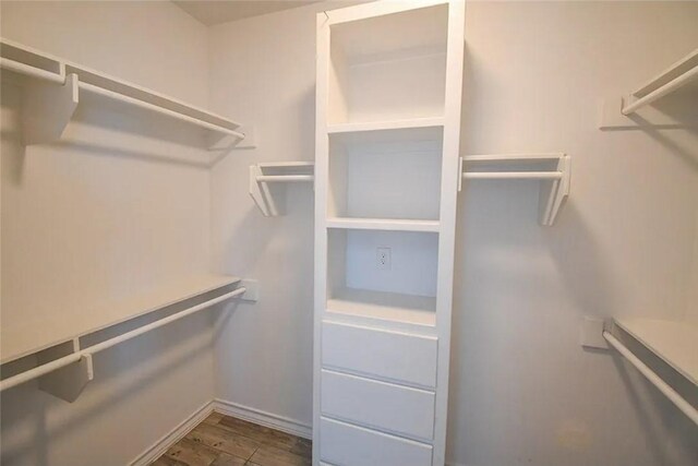 1325 S Mccampbell St, Aransas Pass, TX 78336 - spacious closet featuring dark wood-style flooring