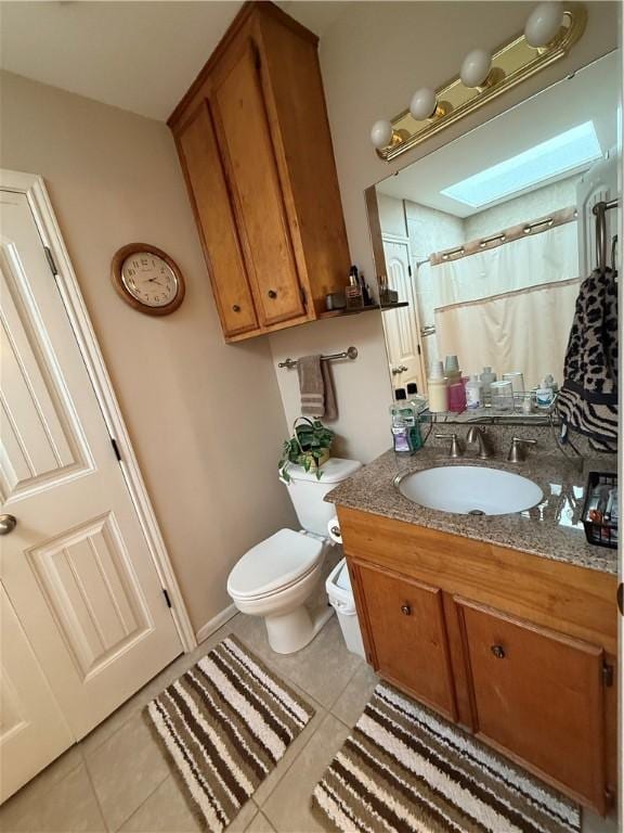 5953 Cinnamon Oaks Dr, Corpus Christi, TX 78414 - bathroom with tile patterned floors, vanity, and a shower with shower curtain