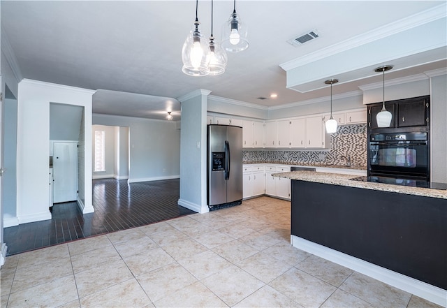 kitchen with black appliances, white cabinets, crown molding, and light hardwood / wood-style flooring