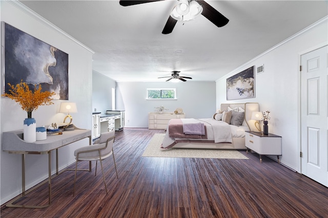 bedroom featuring dark hardwood / wood-style floors, ceiling fan, and crown molding