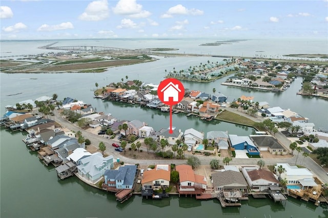 aerial view featuring a residential view and a water view