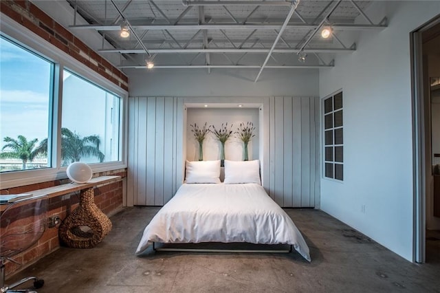 901 N Upper Broadway St Unit 206, Corpus Christi, TX 78401 - bedroom with concrete floors