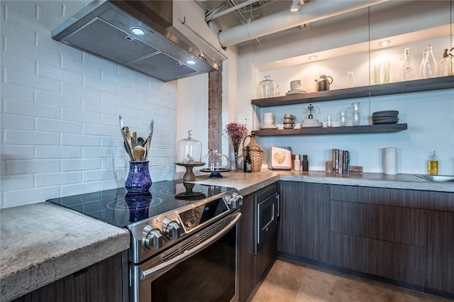 901 N Upper Broadway St Unit 206, Corpus Christi, TX 78401 - kitchen with custom exhaust hood, electric range, open shelves, tasteful backsplash, and light countertops