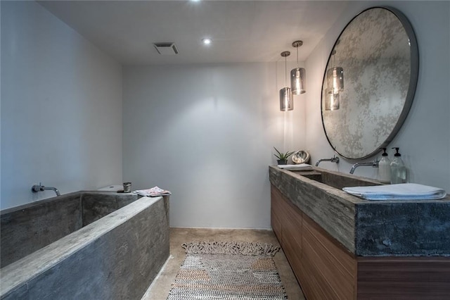 901 N Upper Broadway St Unit 206, Corpus Christi, TX 78401 - full bathroom with double vanity, a bath, and recessed lighting