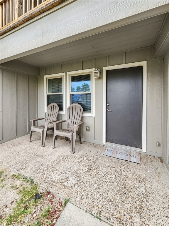 doorway to property featuring a patio