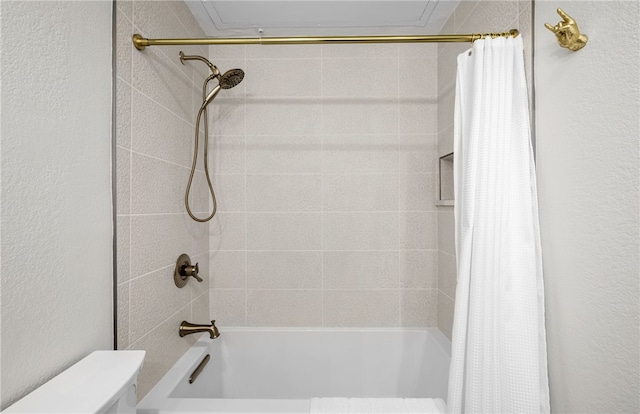 bathroom with shower / bath combo