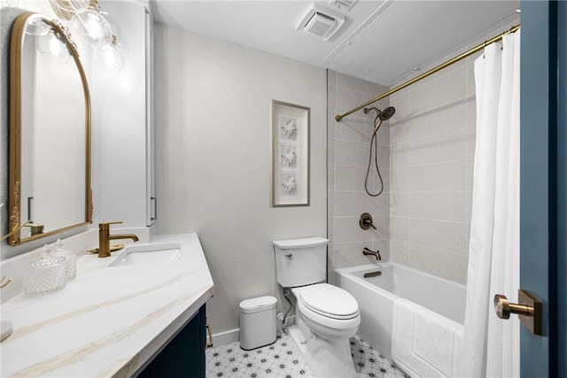 full bathroom featuring vanity, shower / tub combo, and toilet