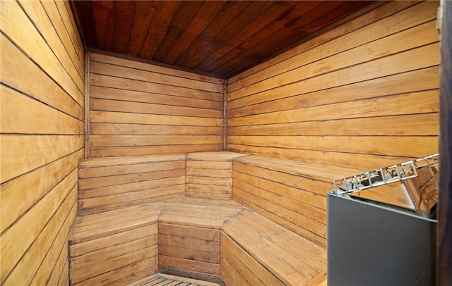 view of sauna / steam room with wood walls and wood ceiling