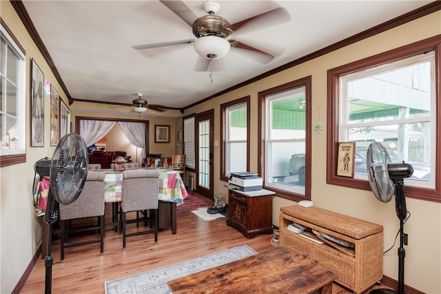 interior space with ceiling fan