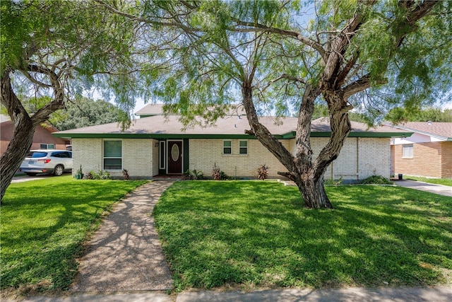 ranch-style house with a front lawn