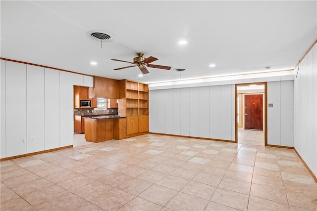 unfurnished living room featuring recessed lighting, visible vents, baseboards, and ceiling fan