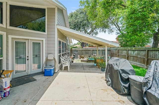6906 Whalen Dr, Corpus Christi, TX 78413 - view of patio featuring french doors and a grill