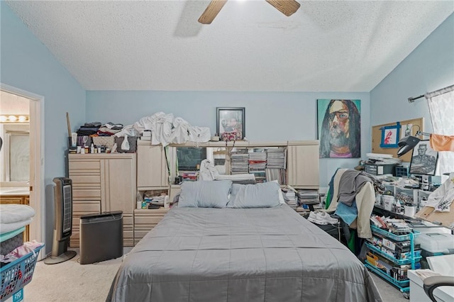 6906 Whalen Dr, Corpus Christi, TX 78413 - bedroom featuring vaulted ceiling, a textured ceiling, carpet floors, a ceiling fan, and ensuite bathroom