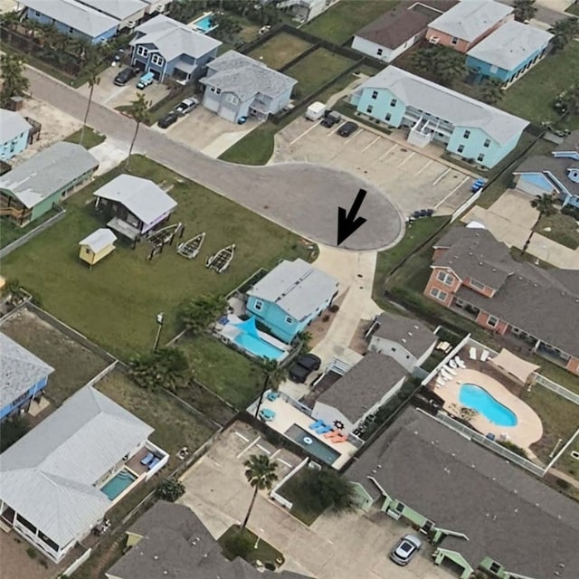 1030 Tenth St S, Port Aransas, TX 78373 - view of property location featuring nearby suburban area and a pool