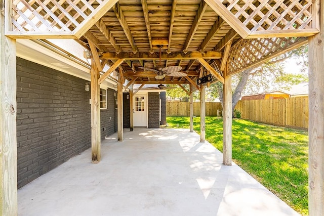 view of patio / terrace with a fenced backyard and a ceiling fan