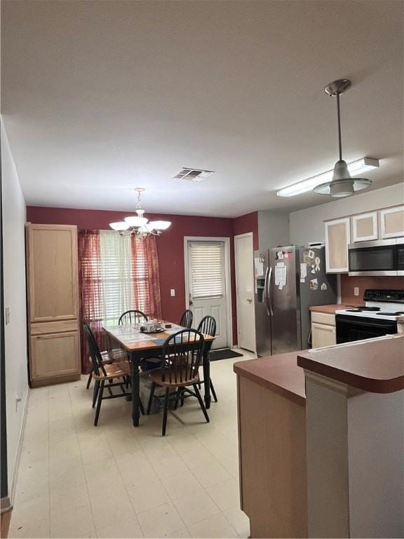 3101 Saskatchewan Dr, Corpus Christi, TX 78414 - dining area with a chandelier and light floors