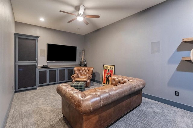 carpeted living area with recessed lighting, baseboards, and a ceiling fan