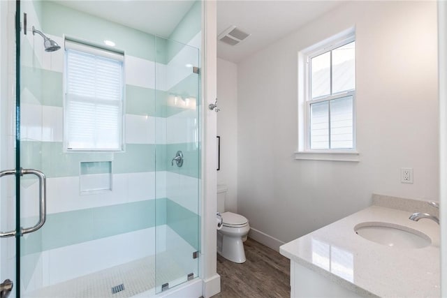 full bathroom featuring toilet and a shower stall