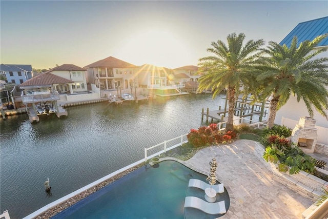 dock area with a water view