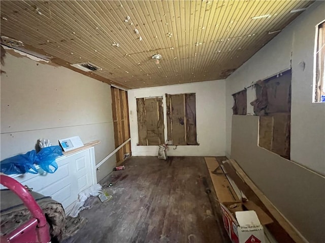 miscellaneous room with wood ceiling and visible vents