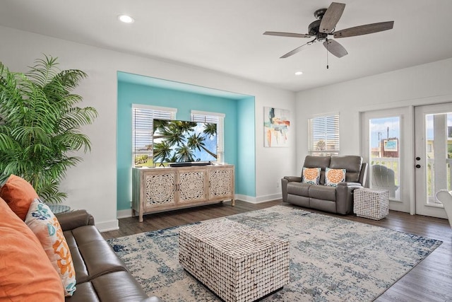 living room with baseboards, recessed lighting, a ceiling fan, and wood finished floors