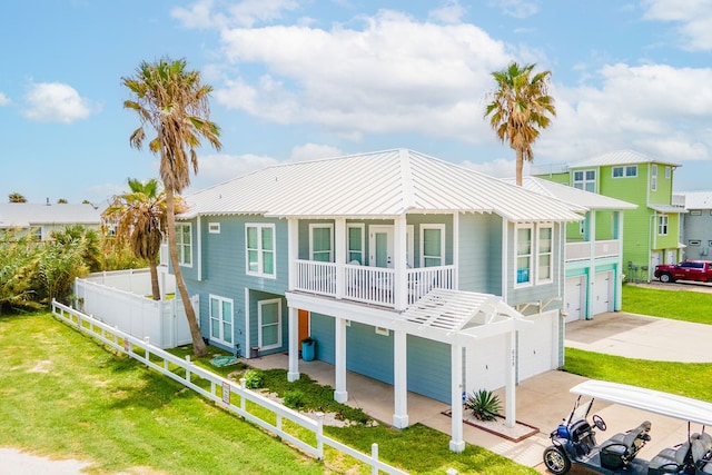 view of front of home with a garage and a front yard