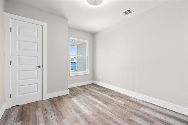 15501 Cruiser St Unit A, Corpus Christi, TX 78418 - unfurnished room featuring wood finished floors and baseboards